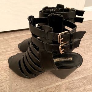 Sexy Audrey Brooke gladiator sandals.
